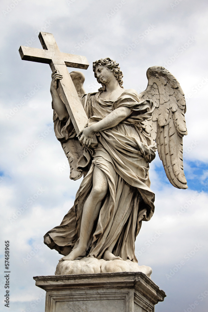 Naklejka premium Angel with cross at the famous Sant' Angelo bridge in Rome, Ital