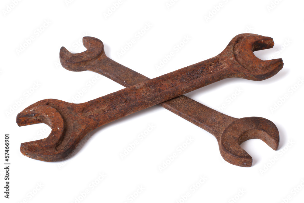 Two large rusty wrenches isolated on white background