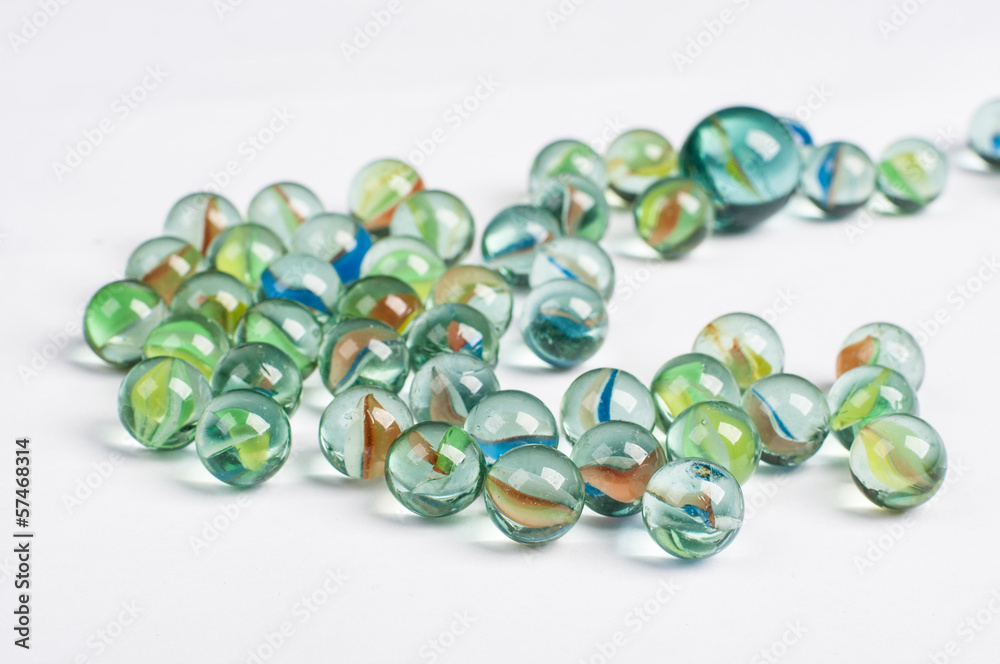 glass marbles on the white background glass marbles on the white background