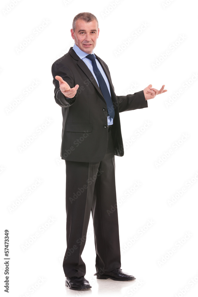 business man welcomes you with hands opened business man welcomes you with hands opened