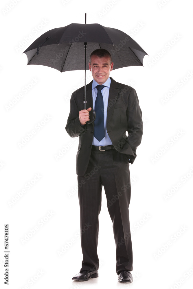 business man holds his umbrella business man holds his umbrella
