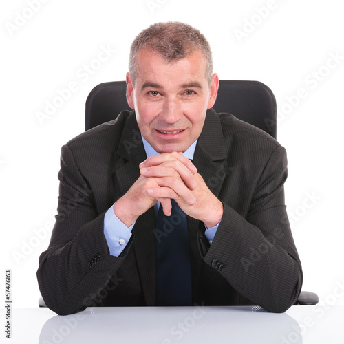 Slika na platnu business man sits with hands together