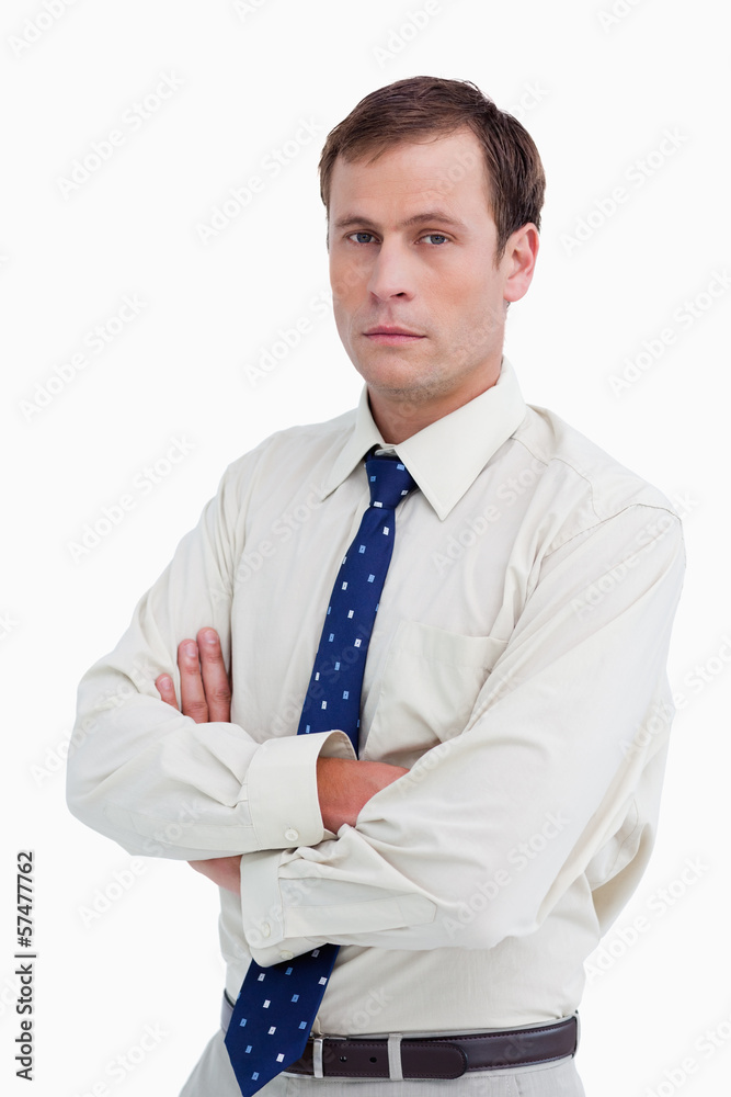 Close up of serious businessman with his arms folded Close up of serious businessman with his arms folded