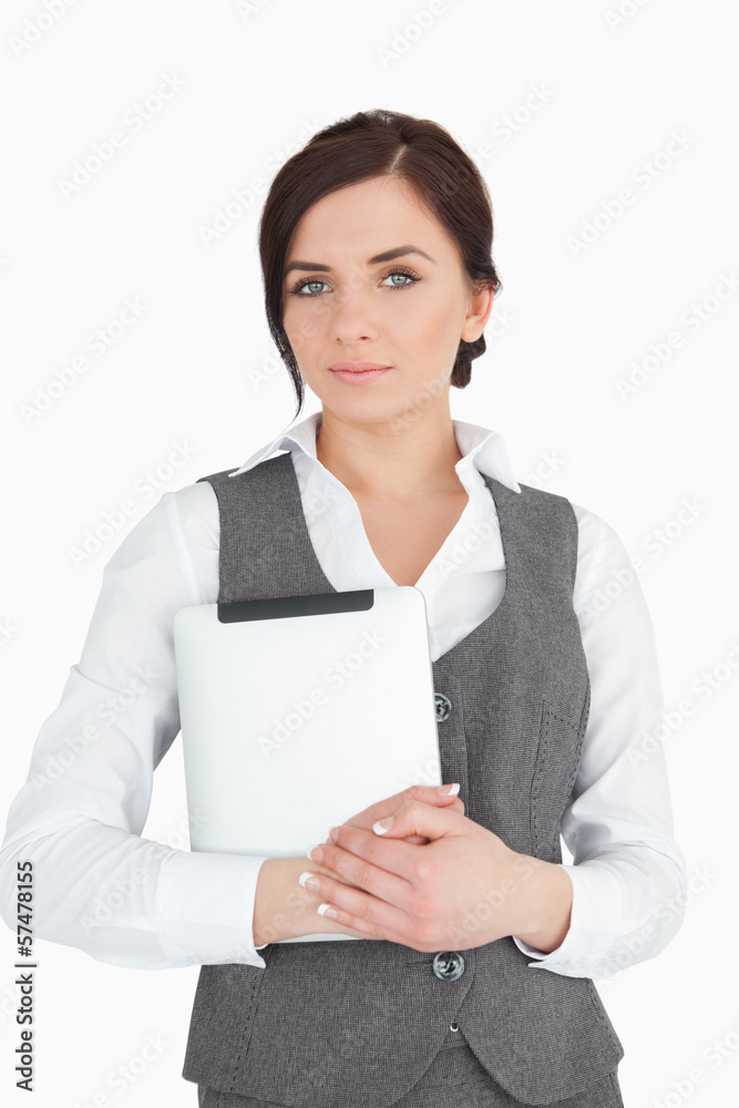 Blue eyed businesswoman holding a digital tablet Blue eyed businesswoman holding a digital tablet