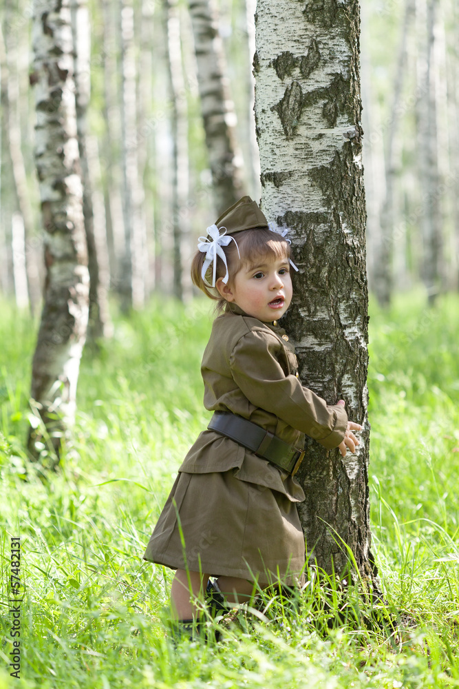 little girl in a military uniform