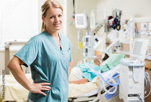 Photos Confident Nurse With Patient Resting In Hospital