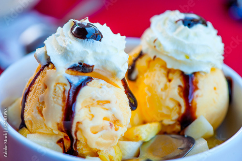 Delicious Ice Cream in white bowl. Colourful close-up