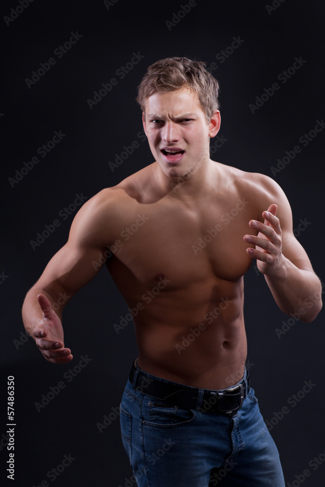 Muscle sexy naked young man posing in jeans Muscle sexy naked young man posing in jeans