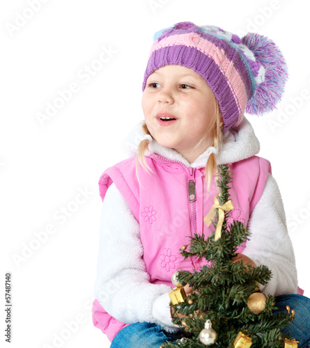 portrait of a little girl dressed in winter clothes photo