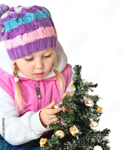portrait of a little girl dressed in winter clothes photo