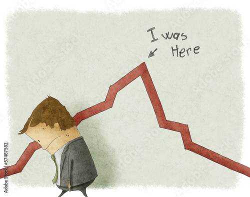 sad businessman standing near graphic