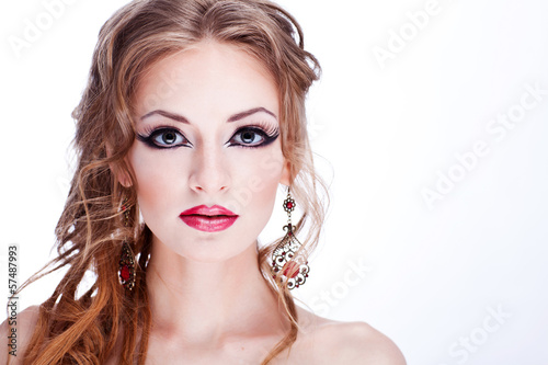 Fashion girl portrait. Red glossy lips.