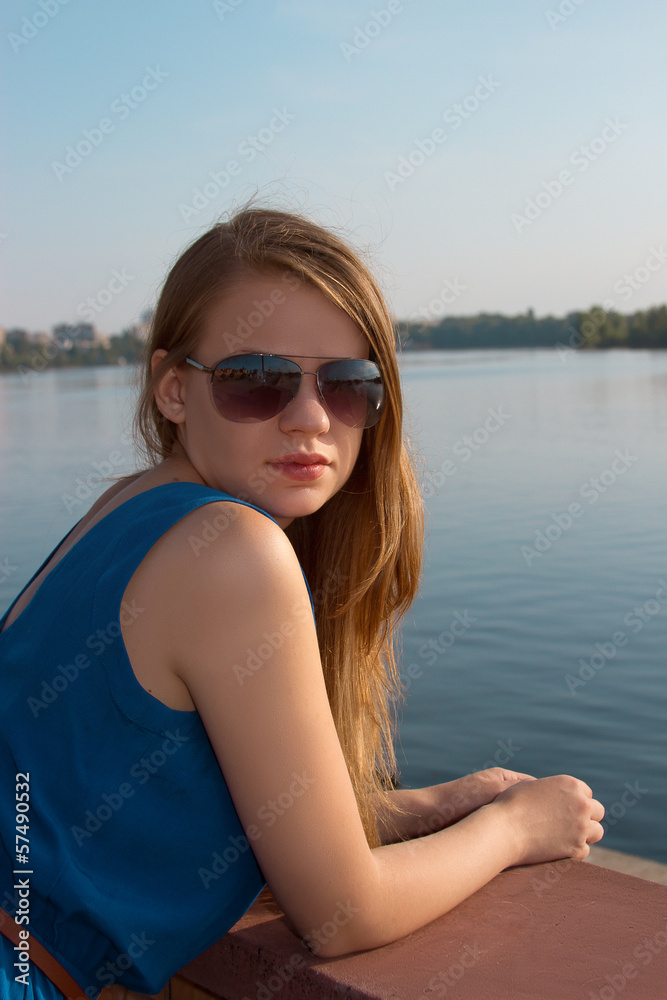 girl on the background of river girl on the background of river