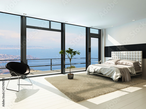 Contemporary modern sunny bedroom interior with huge windows