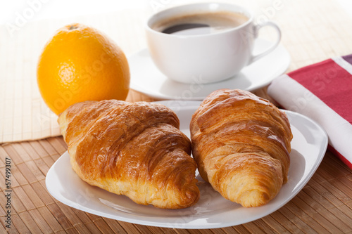 Coffee break with croissant