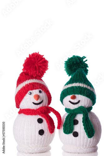 couple of snowman with red and green hat and scarf