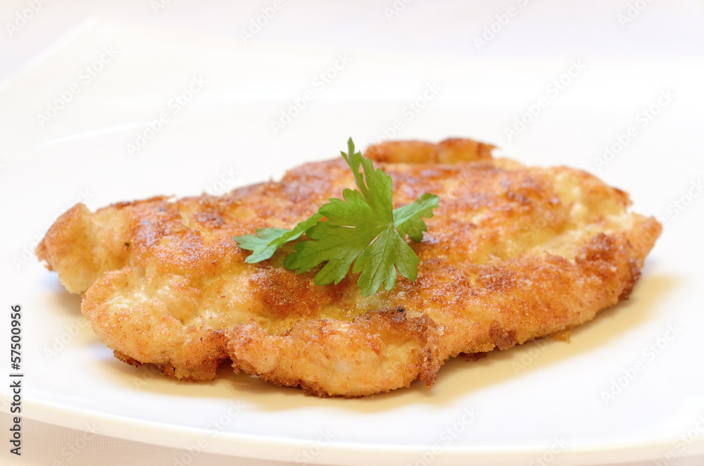 Schnitzel on white plate