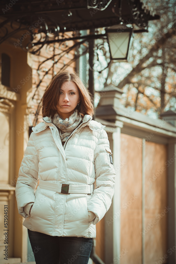 Outdoor fashion portrait of young beautiful woman