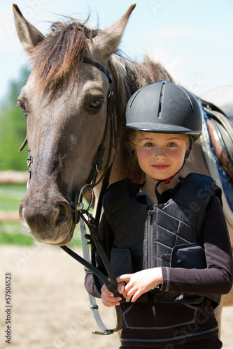 Horse and lovely equestrian girl