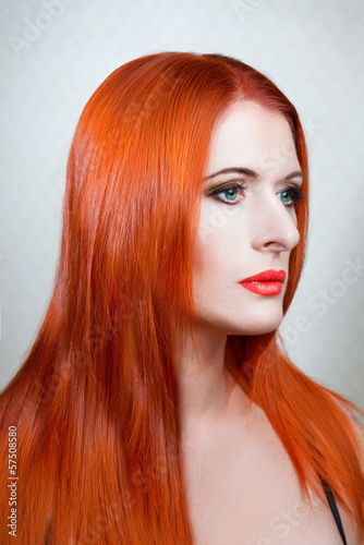 woman with healthy long red hair.