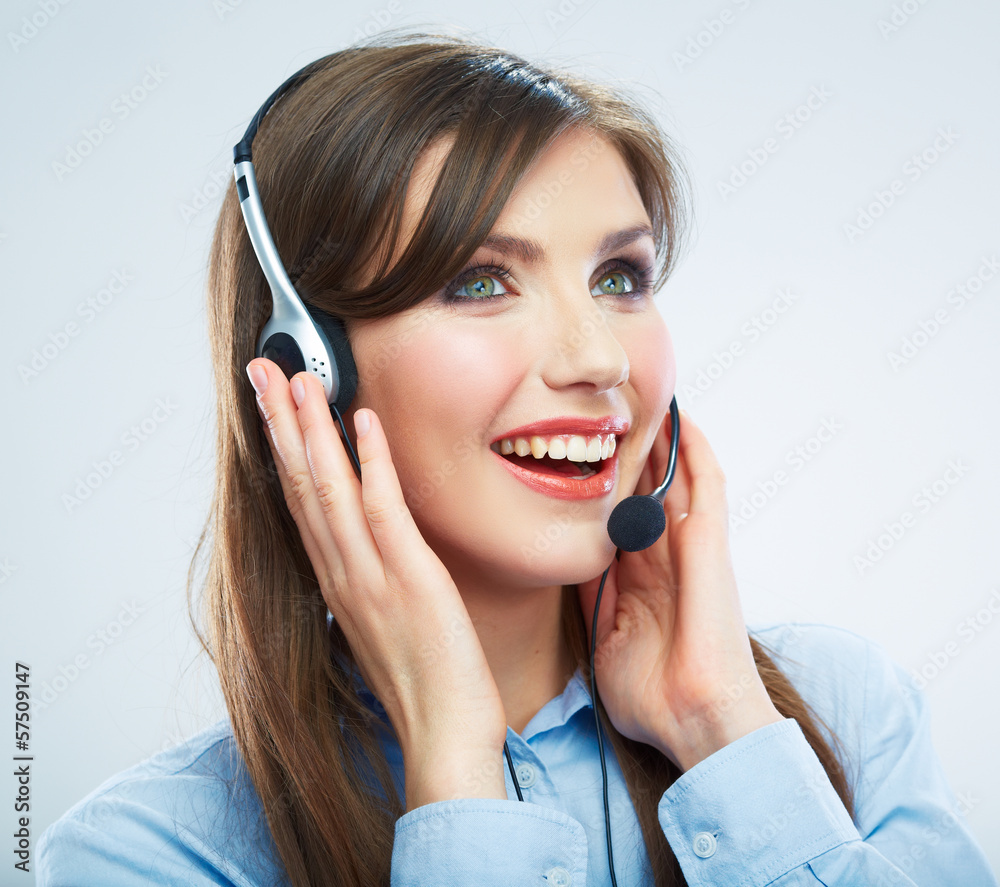 Smiling woman call center operator touching headsed. Close up b