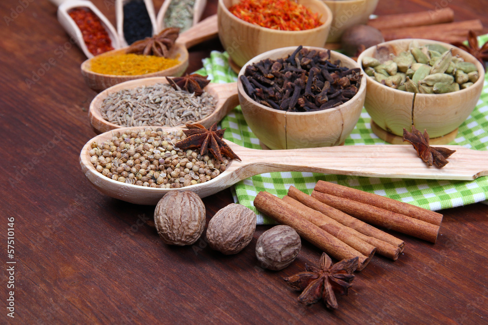 Various spices and herbs on table close up Various spices and herbs on table close up
