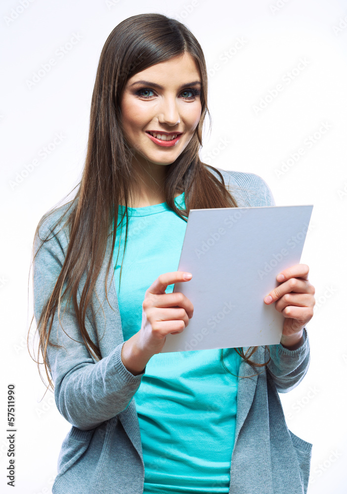 Teenager girl hold white blank paper. Young smiling woman show Teenager girl hold white blank paper. Young smiling woman show
