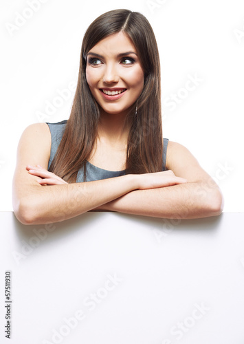Young smiling woman show blank board.