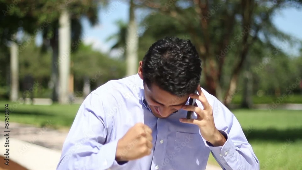 Happy businessman. great news.  talking on the phone.