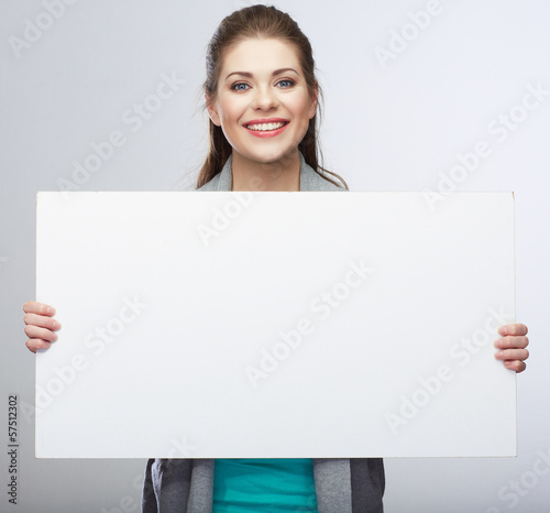 Teenager girl hold white blank banner.