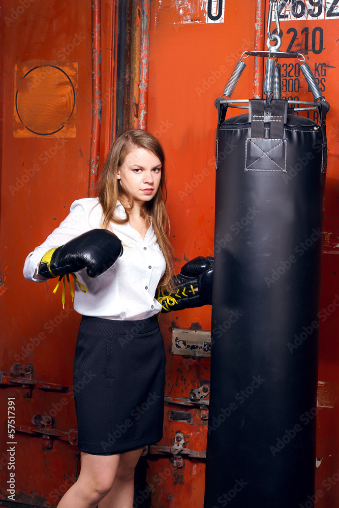 businesswoman with boxing gloves