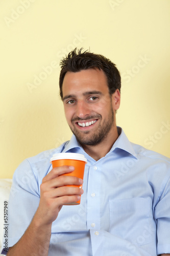 Latin man drinking coffee