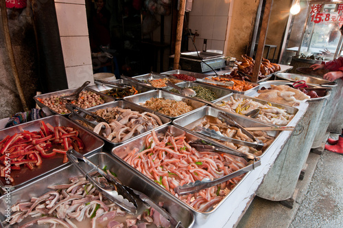 stall with various meat and seafood on foo market in Shanghai