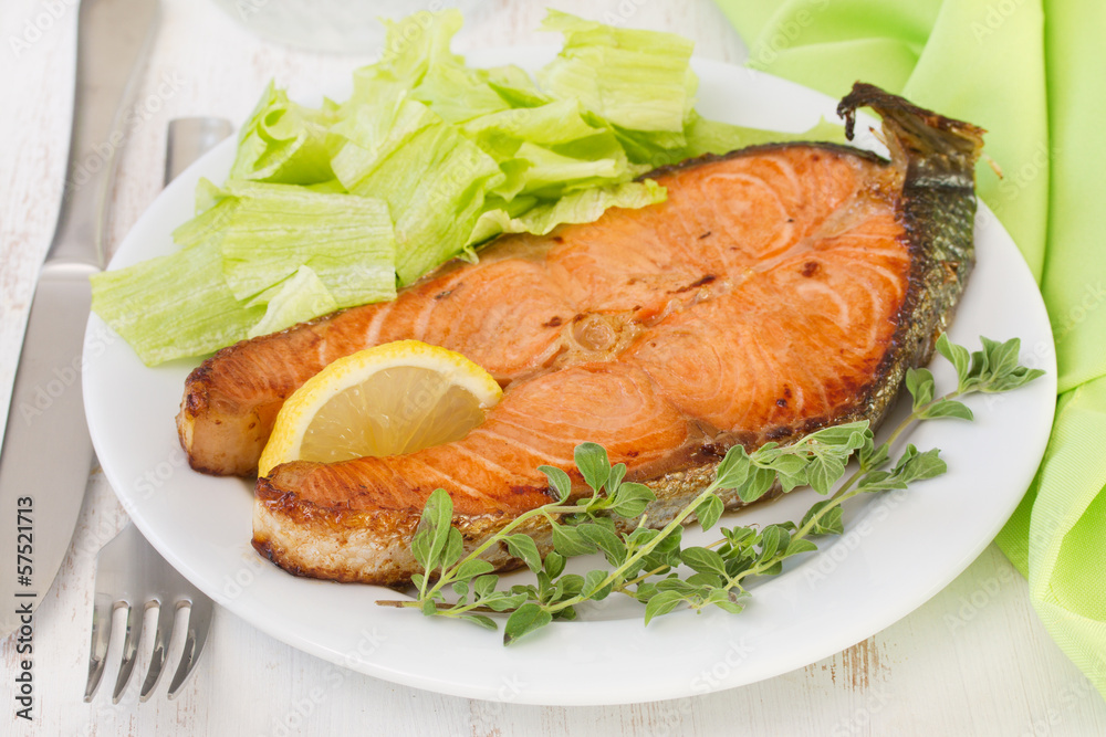 fried fish with lemon and lettuce fried fish with lemon and lettuce
