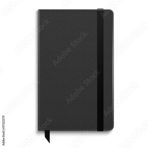 Black copybook with elastic band. photo