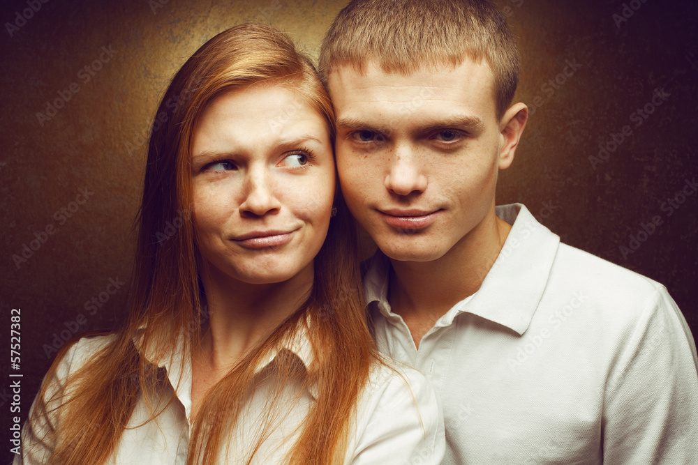 Emotive portrait of happy gorgeous red-haired fashion twins Emotive portrait of happy gorgeous red-haired fashion twins