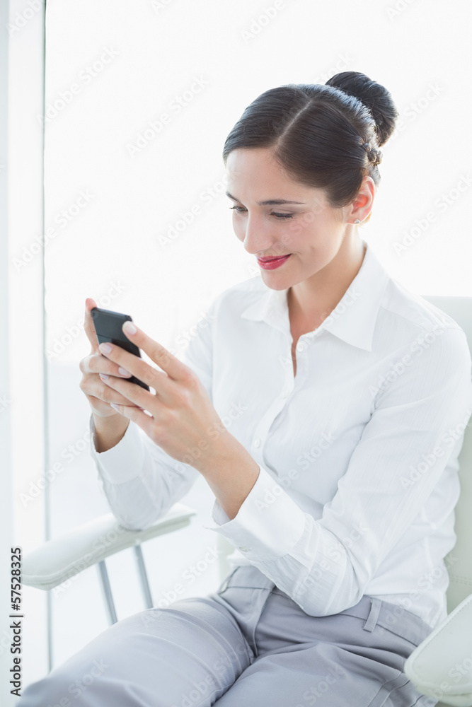 Business woman with mobile phone