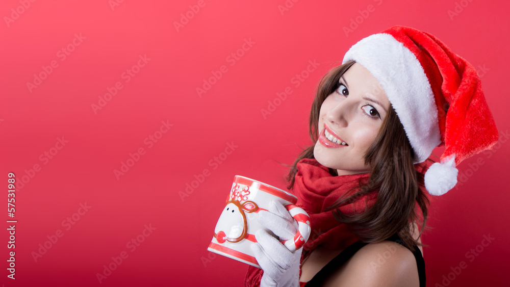 Woman holding tea cup on red background Woman holding tea cup on red background