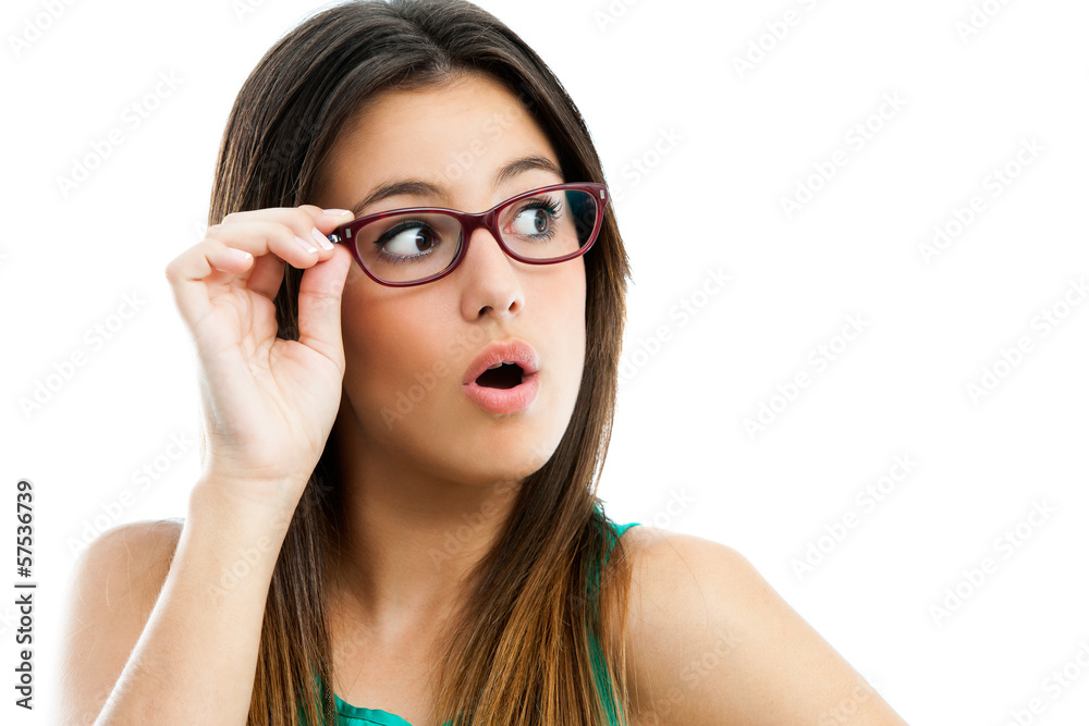 Cute teen girl with glasses looking aside. Cute teen girl with glasses looking aside.