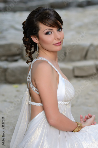 Portrait of a beautiful girl in white. Gentle and elegant style.