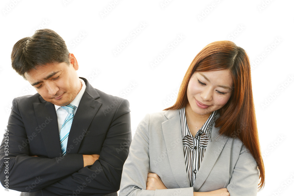 悩むビジネスマンとＯＬ