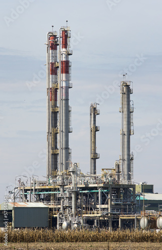 Chimneys of oil refining and gas industry photo