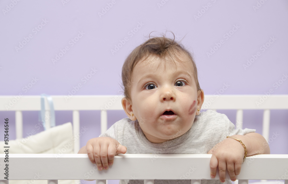 Baby and Kiss in crib Baby and Kiss in crib