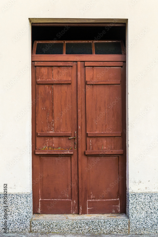 Old rustic wooden gate painted in brown Old rustic wooden gate painted in brown