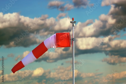 windsock over stormy sky