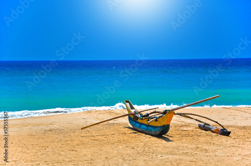 Fényképezés Fishing boat in beautiful beach