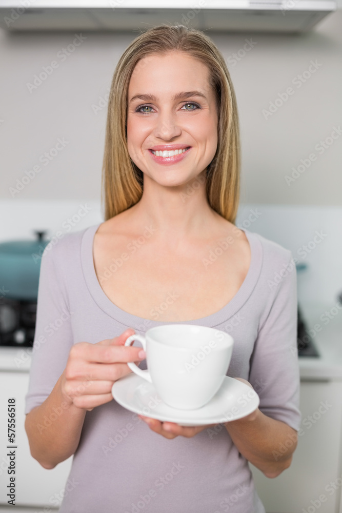 Cheerful gorgeous model holding plate with cup Cheerful gorgeous model holding plate with cup