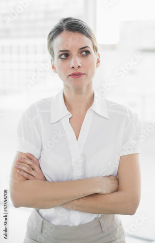 Free Download Thoughtful businesswoman posing in her office - GFXLoad