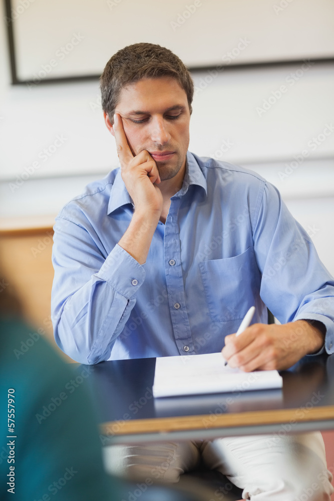 Concentrated mature student sitting in classroom Concentrated mature student sitting in classroom
