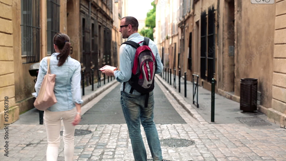 Lost arguing couple looking for direction using tablet Lost arguing couple looking for direction using tablet